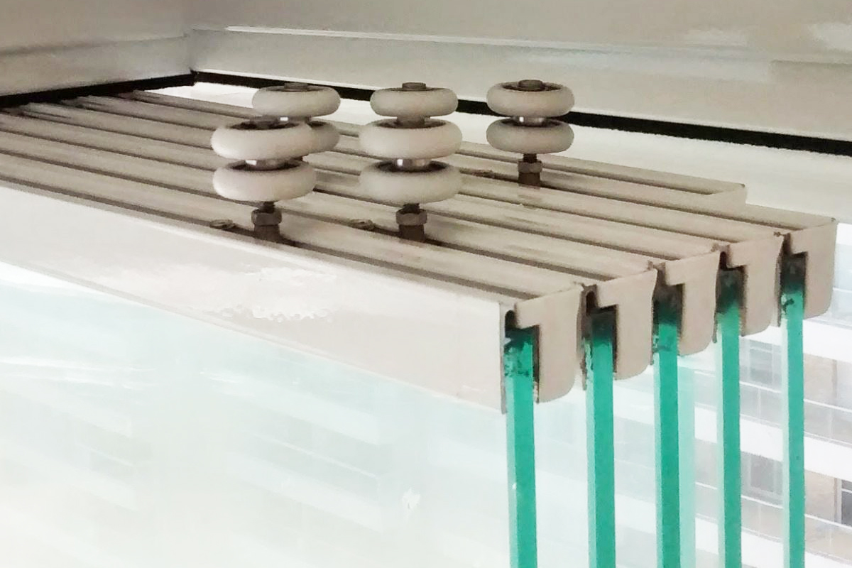 Troca de Roldana em Sacada de Vidro